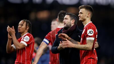 Bristol City manager Lee Johnson, centre, after the match with Jamie Paterson. Carl Recine / Reuters