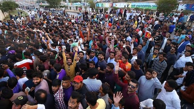 Spectators arrive to watch the opening match of PSL 2020 between Quetta Gladiators and Islamabad United in Karachi on Thursday. EPA