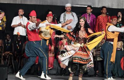 Artists from all the participating troupes perform during the opening ceremony. EPA