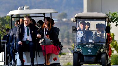 Italy's Finance Minister Giancarlo Giorgetti, left, with other G20 delegates on the outskirts of Bengaluru, India. Reuters
