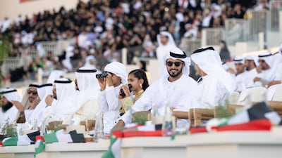 Sheikh Khaled bin Zayed, Chairman of the Board of Zayed Higher Organisation for Humanitarian Care and Special Needs; Sheikh Zayed bin Hamdan; Sheikha Shamma bint Khaled; and Sheikh Mohamed bin Khaled attend the Union Parade during the Sheikh Zayed Heritage Festival. Hamad Al Kaabi / Presidential Court