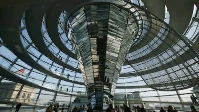 Take a tour of the glass cupola of the Reichstag building in Berlin, Europe's third most popular tourism destination after London and Paris. Getty Images
