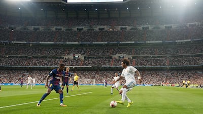 MADRID, SPAIN - AUGUST 16: Marcelo of Real Madrid takes on Nelson Semedo of FC Barcelona during the Supercopa de Espana Final 2nd Leg match between Real Madrid and FC Barcelona at Estadio Santiago Bernabeu on August 16, 2017 in Madrid, Spain. (Photo by Denis Doyle/Getty Images)