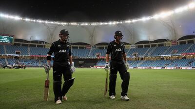 New Zealand batsmen George Worker and Henry Nicholls walk off in Dubai as rain stops proceedings for good in the third ODI with Pakistan. Getty