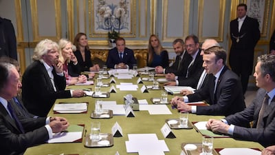 French president Emmanuel Macron meets with US businessman and politician Michael Bloomberg, US entrepreneur Bill Gates, and British entrepreneur Richard Branson on December 12, 2017 at the Elysee palace in Paris. Christophe Archambault / AFP