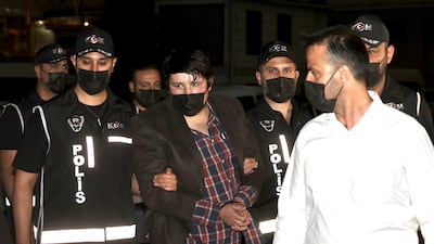 Mehmet Aydin was escorted to the headquarters of Istanbul's police. Getty Images