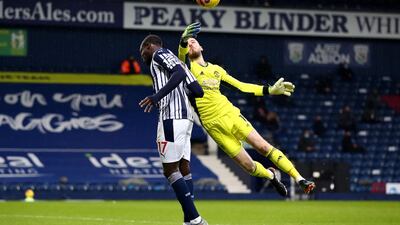 United goalkeeper David de Gea takes the ball off the head of Gaggies attacker Mbaye Diagne. Getty