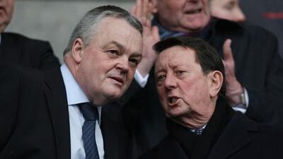 English Premier League chairman Sir Dave Richards (r) speaks to Phil Gartside.