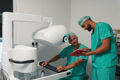 A robotic-assisted surgical system at St Bartholomew's Hospital in London. An astounding revolution in surgical technologies and techniques is under way using robotics and AI. AFP