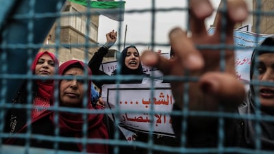 Palestinian women shout slogans during a protest against US aid cuts, outside the United Nations' offices at the Khan Yunis refugee camp in the southern Gaza Strip. Said Khatib / AFP Photo