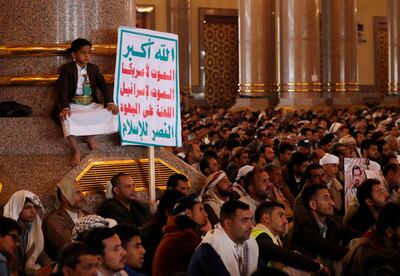 A placard reading 'Allah is the greatest of all, death to America, death to Israel, a curse on the Jews, victory to Islam' during a video address by Houthi leader Abdulmalik Al Houthi at a mosque in Sanaa, Yemen. EPA