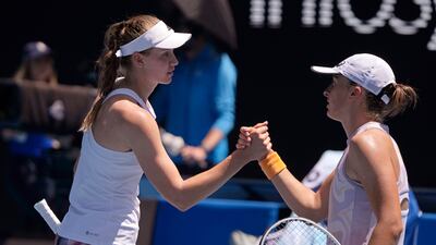Elena Rybakina and Iga Swiatek great each other at the net after their fourth round match at the Australian Open. AP