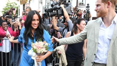 Britain's Prince Harry and Meghan, Duchess of Sussex leave the District Six Museum, on the first day of their African tour in Cape Town, South Africa, September 23, 2019. Reuters