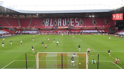 Billy Sharp of Sheffield United scores his team's second goal from a tight angle. Getty