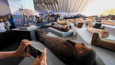 Wooden sarcophagi on display during the unveiling of an ancient treasure trove of more than a 100 intact sarcophagi. AFP