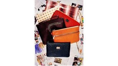 Leather pochettes. Styled by Nadia El Dasher