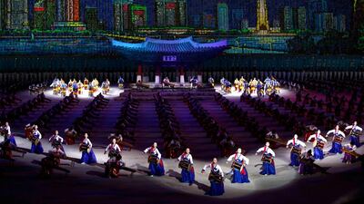 North Korean make artistic performance during an event for the national reunification marking the 11th anniversary of the publication of the Oct. 4 Declaration at the May Day Stadium in Pyongyang. AP