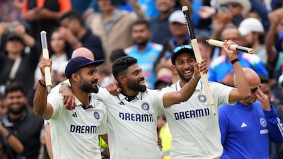 India's Akash Deep, left, Mohammad Siraj, centre, and Prasidh Krishna celebrate victory. AP