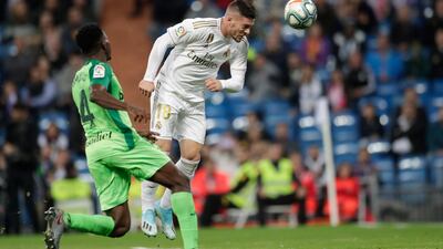 Real Madrid's Luka Jovic, right, heads home, only for the goal to be disallowed for offside. AP