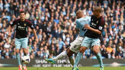 Vincent Kompany of Manchester City scores the second goal against West Ham United at the Etihad Stadium on Sunday. Shaun Botterill / Getty Images