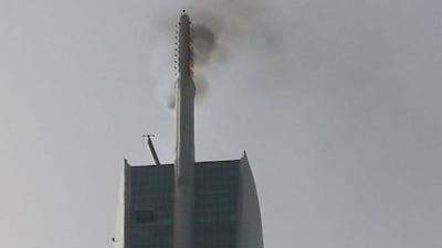 Almas tower in Jumeirah Lake Towers was evacuated on Sunday after a fire broke out in the lightening rod. Courtesy Dubai Civil Defence