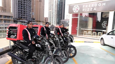 Delivery riders face daily challenges on the UAE's roads. Pawan Singh / The National (stock photo)