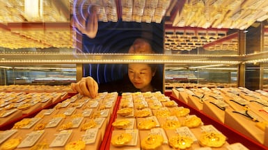 Gold jewellery is displayed in Lianyungang, China. Beyond jewellery, the metal has only meagre industrial use. AFP