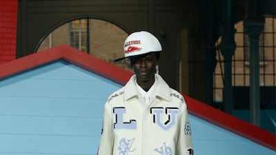 Abloh created a series of male brides, with this model wearing a layered tulle skirt with a varsity jacket. Photo: Louis Vuitton