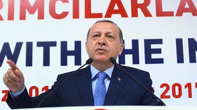 Turkey's president Recep Tayyip Erdogan, addressing foreign investor representatives in Ankara on July 12, 2017, bristles at accusations he is muzzling the press, saying authorities are simply rooting out criminals. 'If the media abuses all kinds of freedoms to cause turmoil in the country or to cause provocations, then there is the judiciary for them too,' he said. Kayhan Ozer/Presidency Press Service via AP