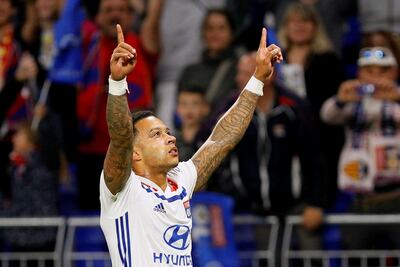 Memphis Depay bagged a hat-trick in Lyon's win over Nice to finish third in Ligue 1 and secure with it Uefa Champions League qualification. Emmanuel Foudrot / Reuters