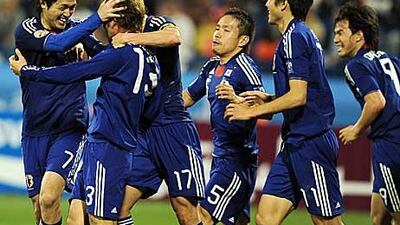 Japanese players celebrate after a hard fought win.
