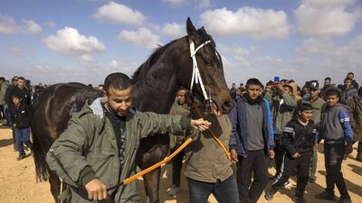 People of all ages congregate, from a range of communities, coming together over a shared love of horse racing