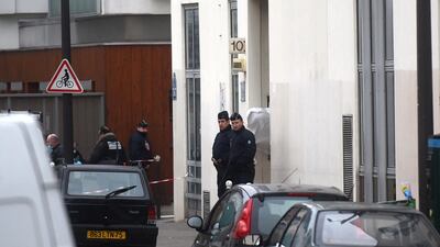 Police officers guard the offices of the French satirical newspaper Charlie Hebdo in January 2015 in Paris, France. Armed gunmen stormed the offices. Getty Images