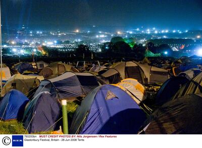 Tents overlooking the huge Glastonbury Festival site. Photo by Nils Jorgensen / Rex Features