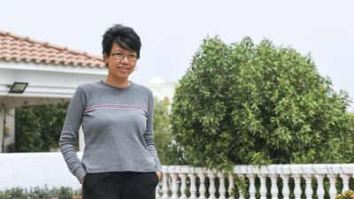 Abu Dhabi owner Jennifer Castro is waiting for clarification on whether her leasehold apartment will receive freehold status. Khushnum Bhandari for The National