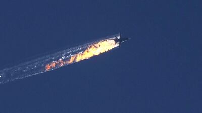A Russian fighter jet after being shot down near the Turkish-Syrian border. The Sukhoi Su-24 was reportedly downed by Turkish forces, Turkish state news agency Anadolu reported, after the jet encroached into Turkish airspace and ignored warnings. EPA