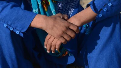 This photograph taken on October 31, 2016 shows an Afghan boy, who was held as a child sex slave, sitting at a restaurant in a unidentified location in Afghanistan. AFP / Aref Karimi