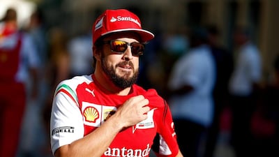 Abu Dhabi Grand Prix fan favourite Fernando Alonso of Scuderia Ferrari walks along the paddock. Valdrin Xhemaj / EPA