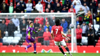 United's Edinson Cavani lobs the ball over Alphonse Areola in the Fulham goal to open scoring. PA