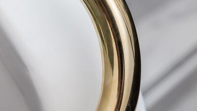 A golden handrail from the washrooms. Courtesy Enstar Capital