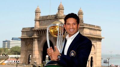 Sachin Tendulkar with the 2011 World Cup trophy in Mumbai. Reuters