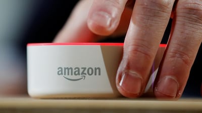 Amazon says an "unlikely" string of events prompted its Echo personal assistant device to record a Portland, Oregon, family's private conversation and then send the recording to an acquaintance in Seattle. AP Photo/Elaine Thompson, file