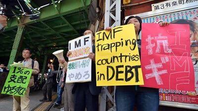 Anti-globalisation activists stage a protest outside of the annual meetings of the World Bank and International Monetary Fund in Tokyo. Yoshikazu Tsuno / AFP