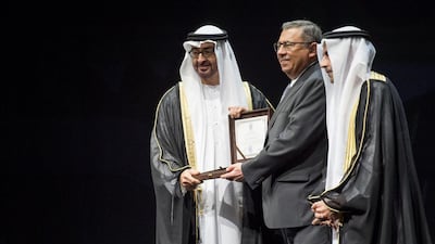 Sheikh Mohammed bin Zayed presents the 2015 ‘Publishing and Technology Award’ to a representative from the Arab Scientific Publishers Inc. of Lebanon. Rashed Al Mansoori / Crown Prince Court - Abu Dhabi