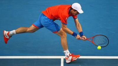 Andy Murray in action against Michael Llodra.