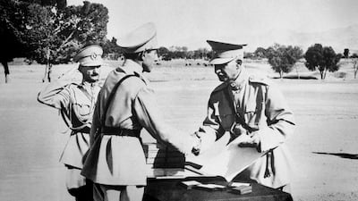 Reza Shah Pahlavi, hands second son, Ali Reza, commission as officer at graduation exercises at Iran's "West Point" in Tehran, Iran prior to Anglo-Russian action in August 1941. The discovery in Iran of a mummified body near the site of a former royal mausoleum has raised speculation it could be the remains of the late Reza Shah Pahlavi, founder of the Pahlavi dynasty. AP / File 