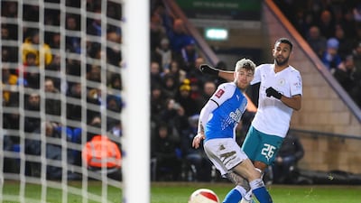 Riyad Mahrez of Manchester City scores his team's first goal during the Emirates FA Cup fifth round match at Peterborough. Getty