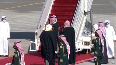 Saudi Crown Prince Mohammed bin Salman embraces Qatari Emir Sheikh Tamim upon arrival at Al Ula