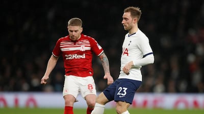 Christian Eriksen in action with Middlesbrough's Adam Clayton. Reuters