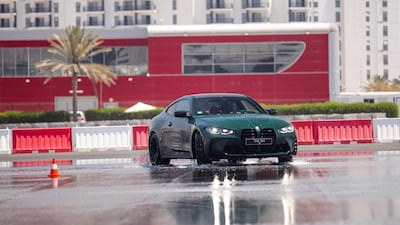 Drifting on the wet track.